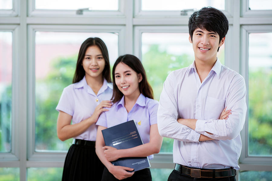 group-of-asian-student-in-thai-university-stand-in-library-anek-suwannaphoom